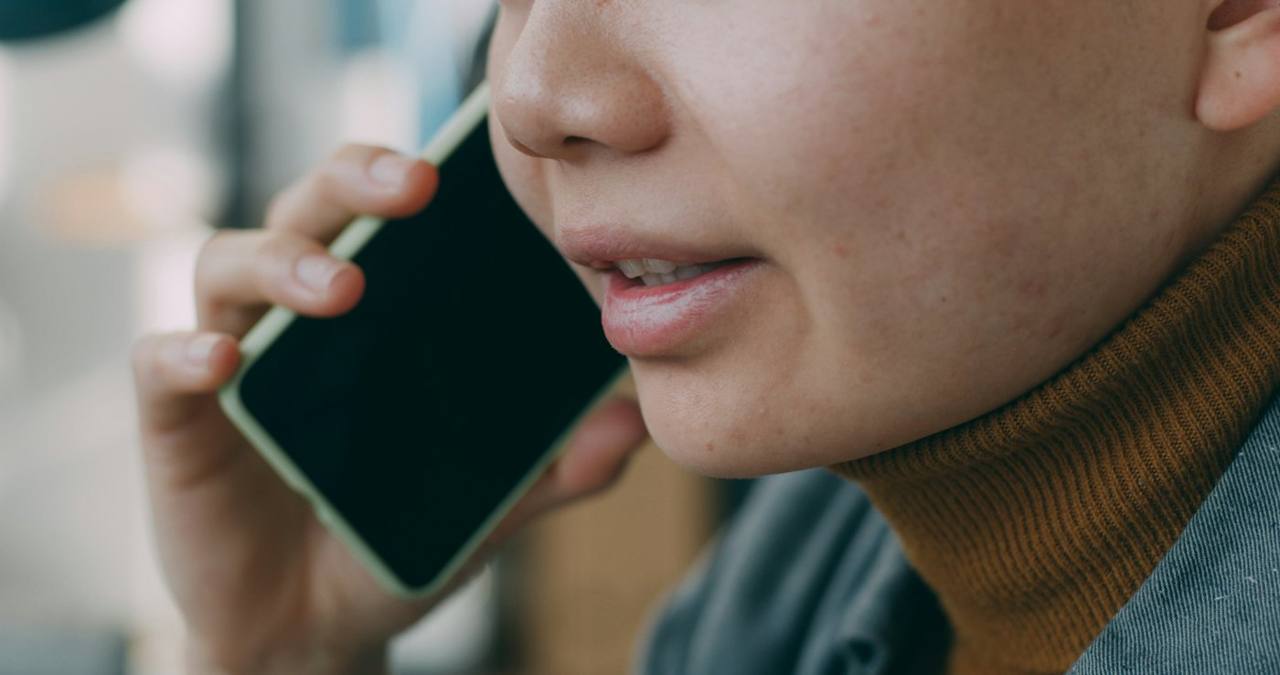 A person talking on a phone