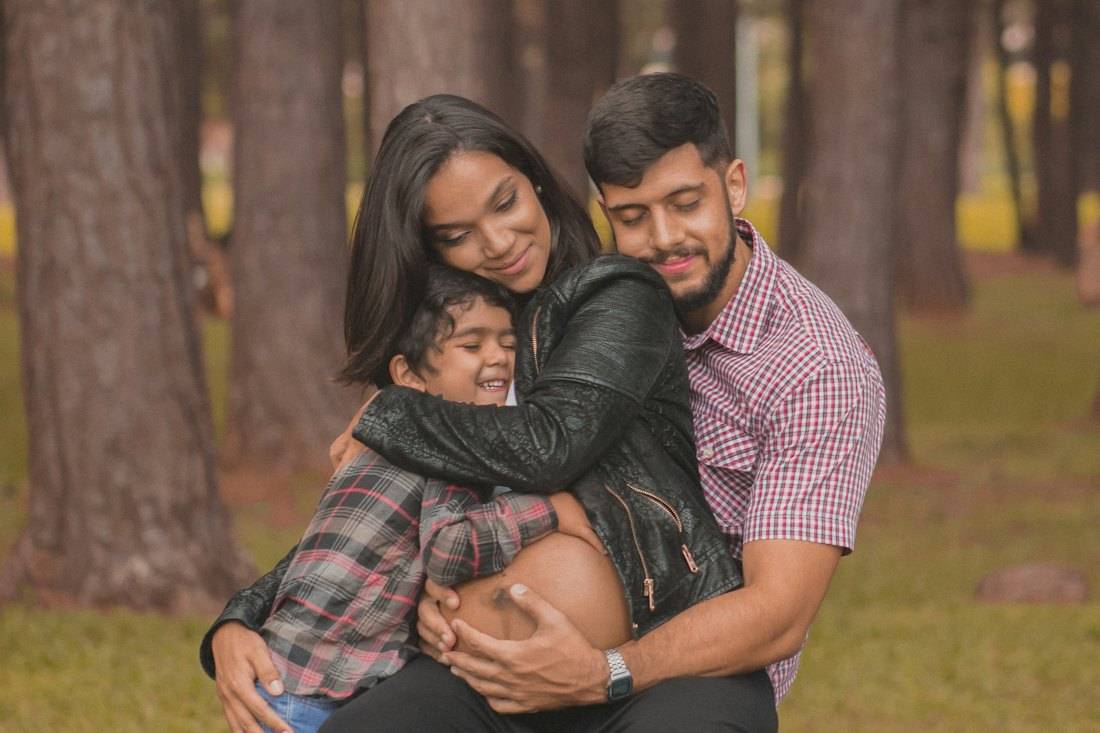 A young family together outdoors