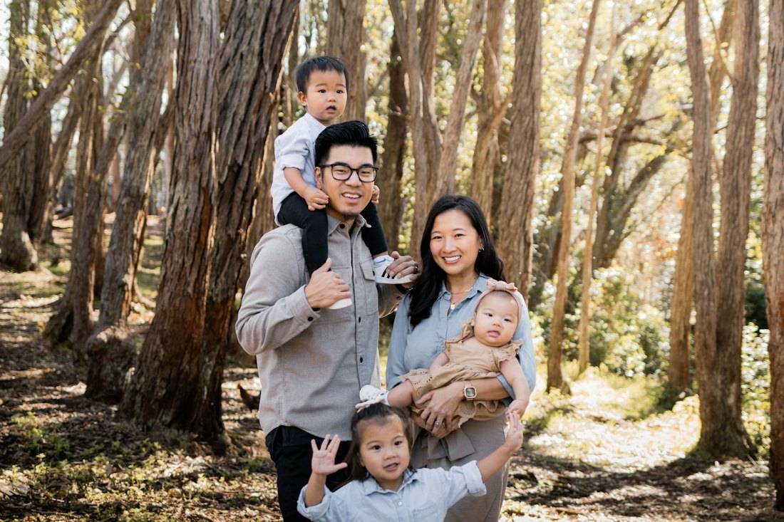A family with young children outdoors