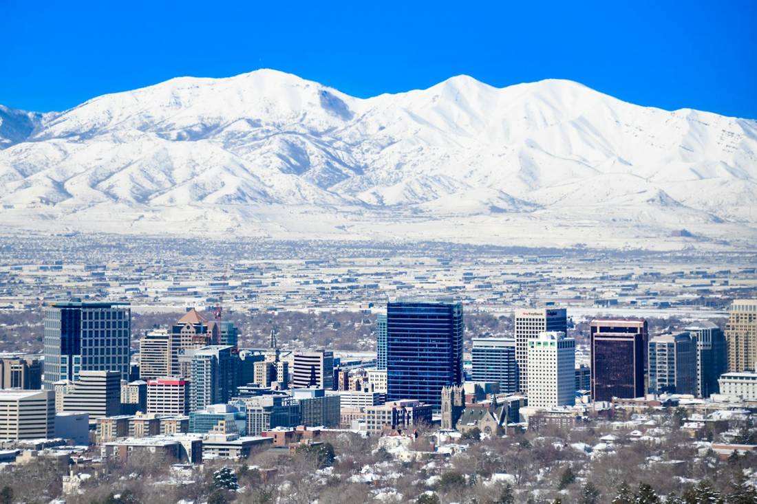 A Utah valley under snowy mountains